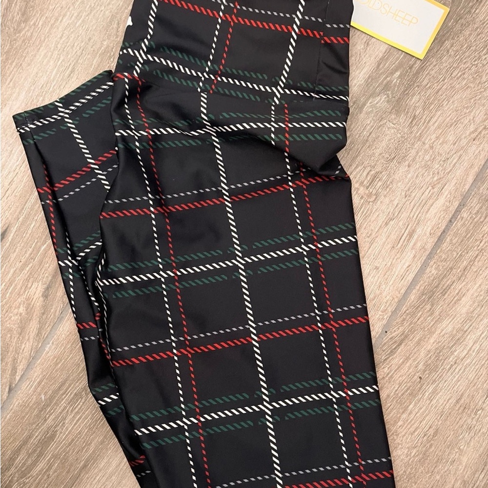 NWT Plaid gold sheep leggings from pure barre 
Brand NWT size L/XL